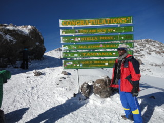 At the peak of Mt Kilimanjaro